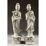 A PAIR OF CHINESE BLANC-DE-CHINE FIGURES of GUANYIN.