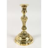 A GOOD BRASS BALUSTER CANDLESTICK. 11ins high.