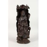 A LARGE CARVED WOOD GUANYIN FIGURE. 18ins high.