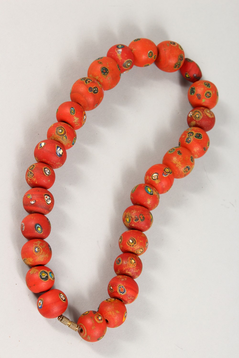 A SET OF RED COLOURED BEADS. - Image 2 of 2