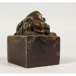 A CHINESE SQUARE BRONZE DESK SEAL.