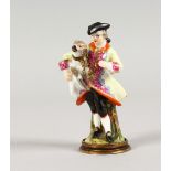 A GOOD 19TH CENTURY PORCELAIN AND ORMOLU SCENT BOTTLE, modelled as a man holding a dog in his