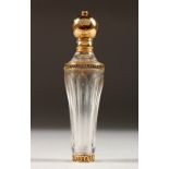 AN 18CT GOLD MOUNTED CUT GLASS SCENT BOTTLE.