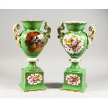 A PAIR OF CONTINENTAL PORCELAIN PEDESTAL VASES painted with figures in an interior and flowers to
