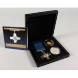 A REPLICA GEORGE CROSS, boxed.