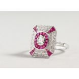 A SUPERB 18CT WHITE GOLD, RUBY AND DIAMOND DECO DESIGN RING.