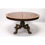 A 19TH CENTURY MAHOGANY AND ROSEWOOD BANDED CIRCULAR TILT TOP BREAKFAST TABLE, with turned and