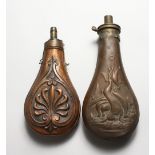 A COPPER POWDER FLASK, embossed with dead hare and game birds, 8ins, brass nozzle detached, spring