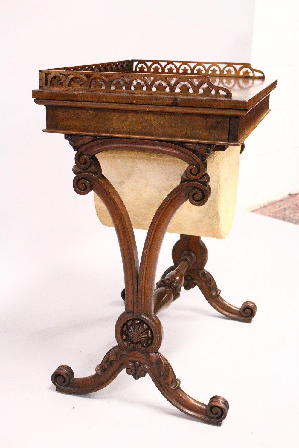 A VICTORIAN WALNUT WORK TABLE, with galleried top over a single drawer and work bag, on curving - Image 3 of 3