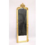 A TALL FRENCH GILT NARROW MIRROR. 5ft 10ins high x 1ft 9ins wide.