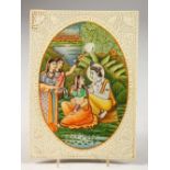 AN INDIAN IVORY MINIATURE, in a pierced surround. 8ins x 5.5ins.