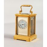 A MINIATURE PLAIN CARRIAGE CLOCK. 2.5ins.