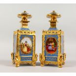 A GOOD PAIR OF JACOB PETIT STYLE FRENCH 19TH CENTURY SQUARE SCENT BOTTLES AND STOPPERS, blue ground,