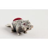 A NOVELTY SILVER BEAVER PIN CUSHION.