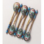 A SET OF SIX RUSSIAN SILVER AND ENAMEL SPOONS.