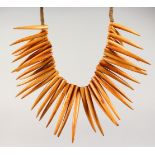 A TRIBAL BONE NECKLACE.