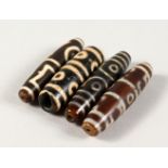 FOUR AGATE BEADS.