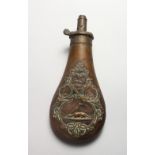 A COPPER POWDER FLASK by JAMES DIXON, one side embossed with four panels, the largest with two