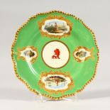 A SUPERB FLIGHT, BARR & BARR APPLE GREEN ARMORIAL PLATE, painted with four vignettes with gilt