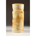 A LARGE CHINESE CARVED WHITE JADE VASE, carved with foliage and key pattern. 10ins high.