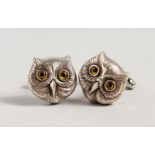 A PAIR OF SILVER OWL CUFFLINKS.