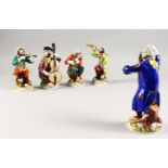 A LARGE DRESDEN FIVE PIECE PORCELAIN MONKEY BAND, comprising conductor in blue, cello, violin, flute