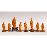A GOOD COLLECTION OF EIGHT CHINESE CARVED BOXWOOD FIGURES, largest 13cm down to 10cm. (8).