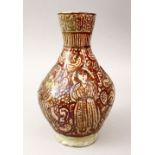 AN EARLY PERSIAN POTTERY VASE OF FIGURES, decorated with figures, (af), 25cm high.