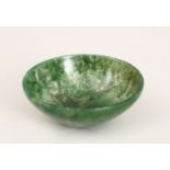 A GOOD CHINESE CARVED MOSS AGATE BOWL, 7.7cm diameter.
