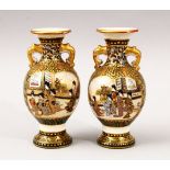 A GOOD PAIR OF SMALL JAPANESE MEIJI PERIOD SATSUMA TWIN HANDLE VASES, with panel decoration