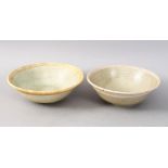 A GOOD PAIR OF EARLY CHINESE POTTERY BOWLS, 13.5cm & 14cm diameter.