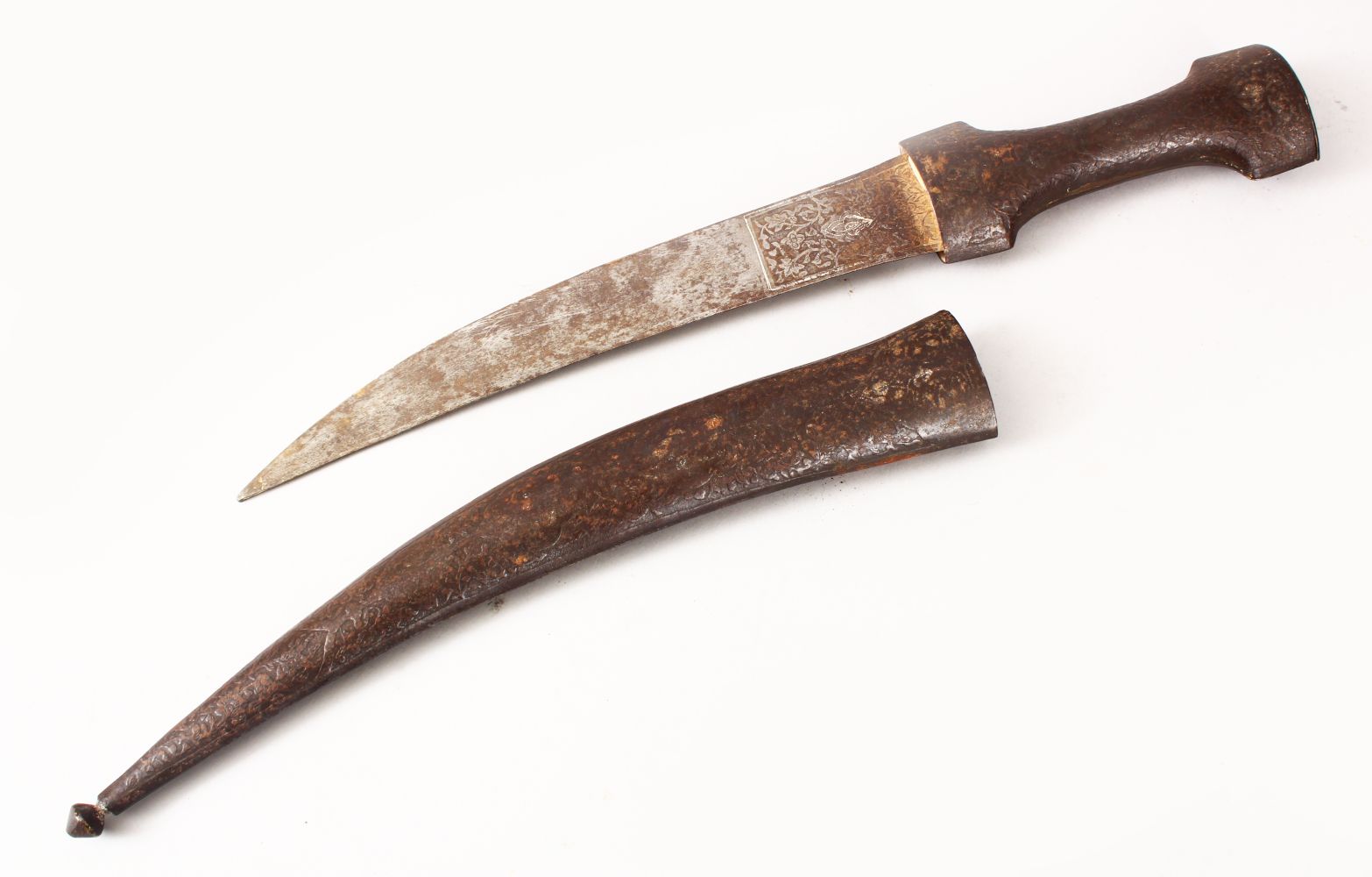 AN EARLY QAJAR STEEL DAGGER, the sheath carved with scrolling foliage, the blade with traces of - Image 2 of 11
