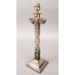 A 19TH CENTURY LARGE SRI LANKAN WHITE METAL CANDLESTICK / LAMP, with carved decoration, possibly