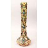 A POSSIBLY TURKISH OTTOMAN GLASS LONG-NECKED VASE, set with many semi precious jewels and moriage