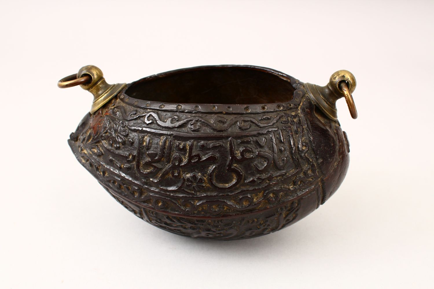 A GOOD 19TH CENTURY ISLAMIC COCO KASHKOOL, carved with Islamic calligraphy and scroll decoration - Image 7 of 14