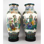 A LARGE PAIR OF FINE QUALITY JAPANESE MEIJI PERIOD PORCELAIN KUTANI IMMORTAL / ARHAT VASES, each