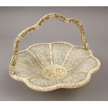 A VERY FINE 19TH CENTURY CHINESE CANTON CARVED IVORY TWIN HANDLED OPEN BASKET, The basket with eight
