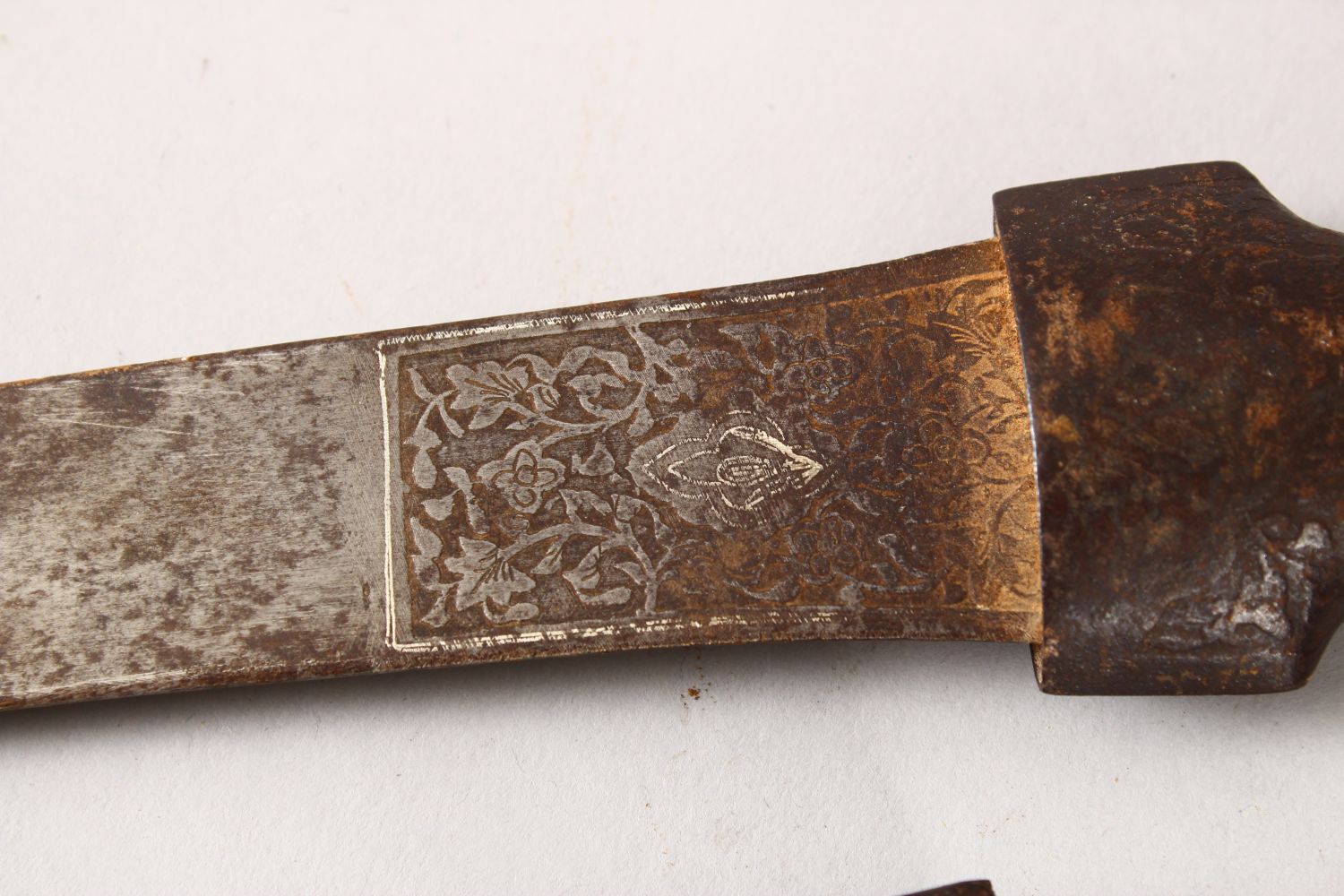 AN EARLY QAJAR STEEL DAGGER, the sheath carved with scrolling foliage, the blade with traces of - Image 4 of 11