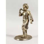 A GOOD INDIAN / ISLAMIC WHITE METAL FIGURE OF A MAN, the man upon a stylized shell base with an