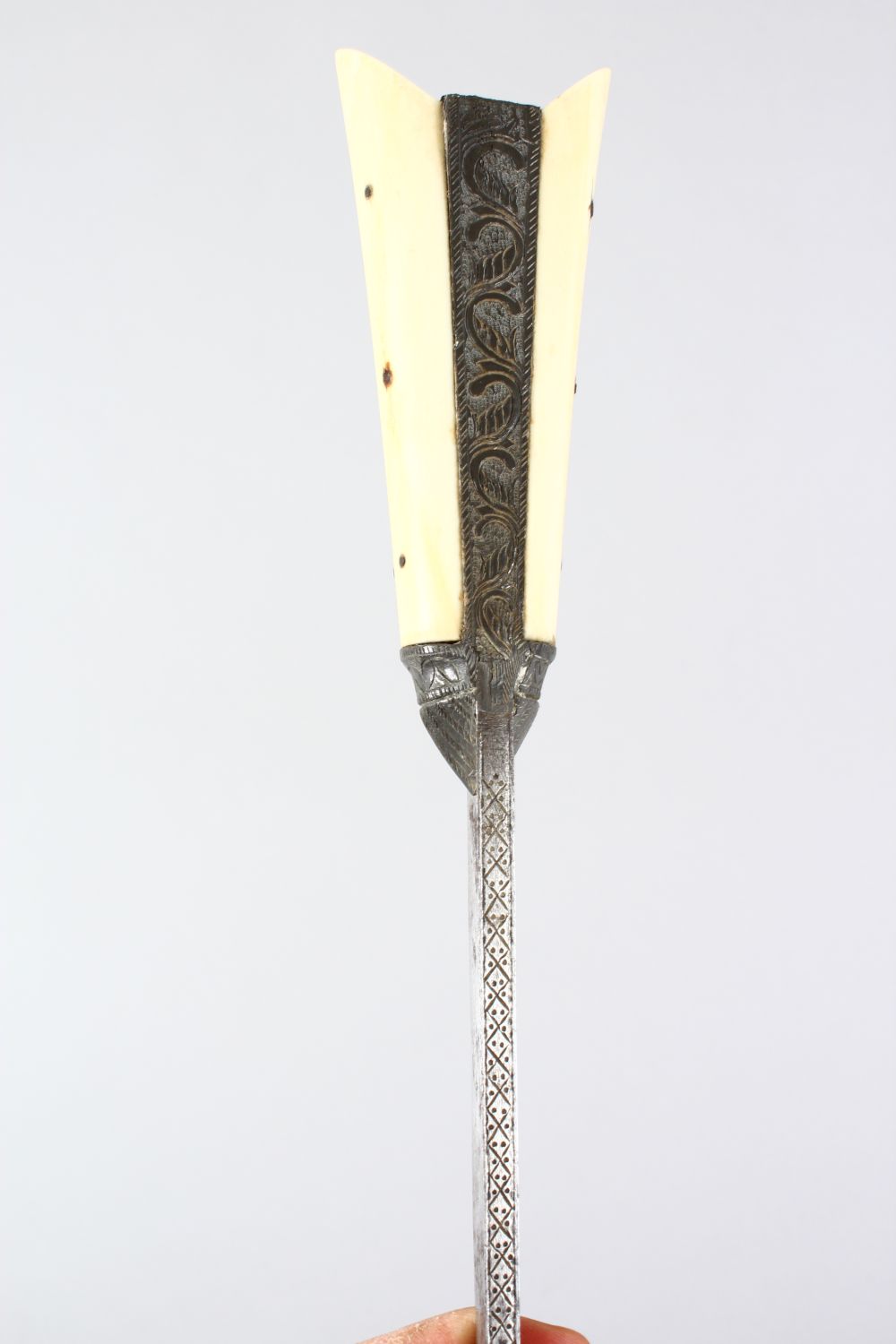 A GOOD 19TH CENTURY ISLAMIC / PERSIAN BONE HANDLED DAGGER, in its metal mounted and leather bound - Image 8 of 10