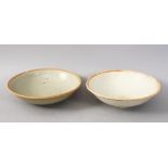 A GOOD PAIR OF EARLY CHINESE POTTERY BOWLS, 14.5cm diameter.