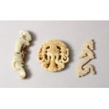 THREE CHINESE CARVED JADE / HARD STONE PENDANTS, two depicting figures, one in the form of a