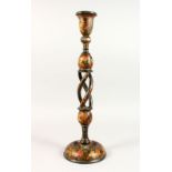 A LARGE 19TH CENTURY INDIAN CASHMIRE CANDLESTICK, with finely painted floral decoration, 51cm high