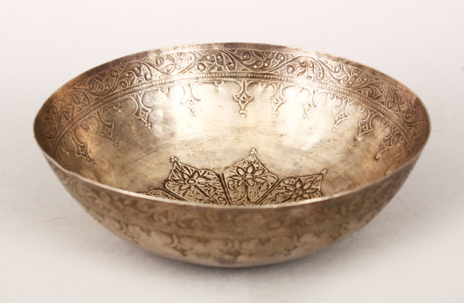 AN 19TH CENTURY ISLAMIC MALAYSIAN SILVER BOWL, the exterior engraved with scrolling foliate - Image 2 of 8