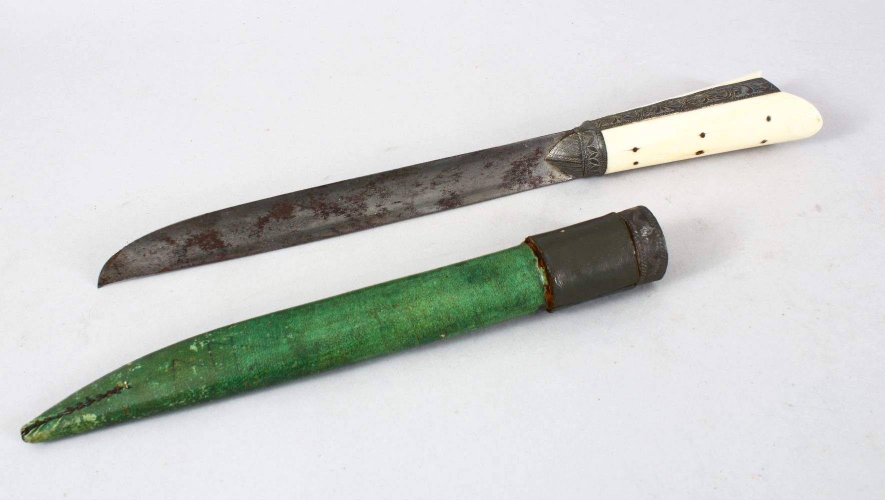 A GOOD 19TH CENTURY ISLAMIC / PERSIAN BONE HANDLED DAGGER, in its metal mounted and leather bound - Image 2 of 10