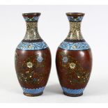 A PAIR OF JAPANESE MEIJI PERIOD CLOISIONNE VASES, both decorated with gold speck fan panels with