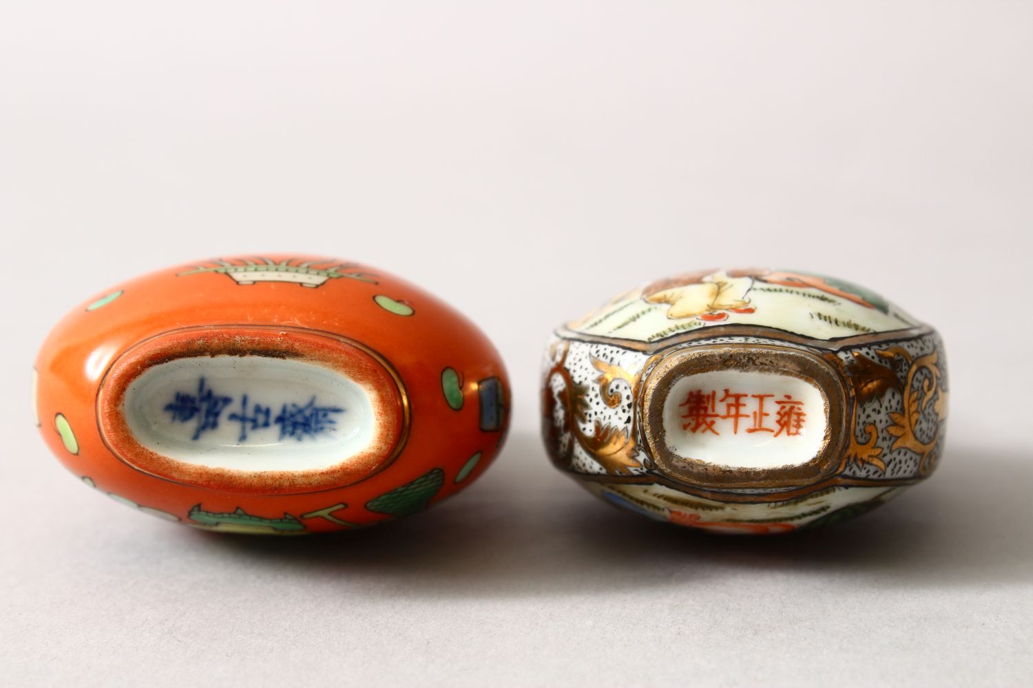 TWO 19TH / 20TH CENTURY CHINESE FAMILLE ROSE PORCELAIN SNUFF BOTTLES, one with a coral red ground - Image 6 of 8