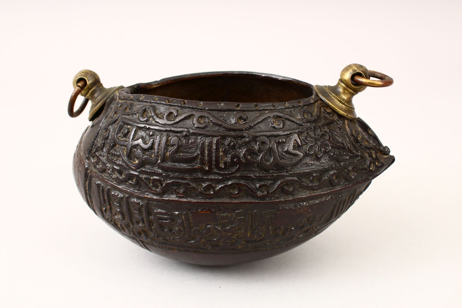 A GOOD 19TH CENTURY ISLAMIC COCO KASHKOOL, carved with Islamic calligraphy and scroll decoration - Image 5 of 14