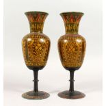 A GOOD PAIR OF 19TH CENTURY INDIAN HOSHIAPUR SPILL VASES, the painted wooden vases with floral