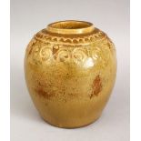 A GOOD CHINESE TEA DUST GLAZED POTTERY MOULDED JAR, 15.5cm high